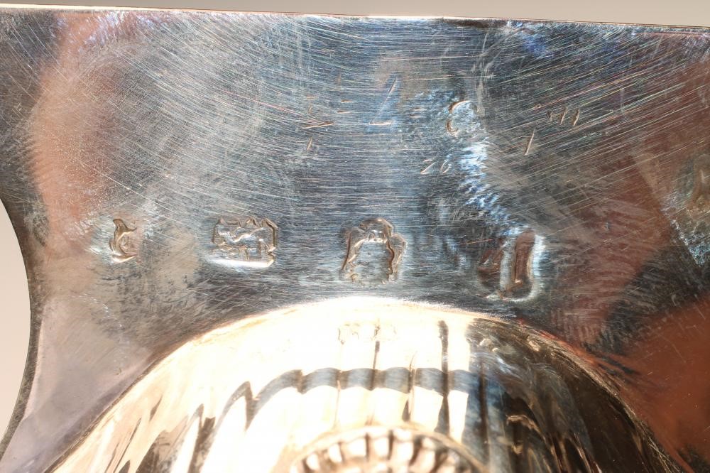 A GEORGE II SILVER BUTTER SHELL Image