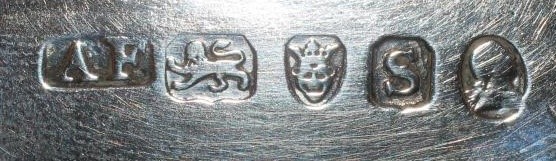 A GEORGE III SILVER TEAPOT STAND Image