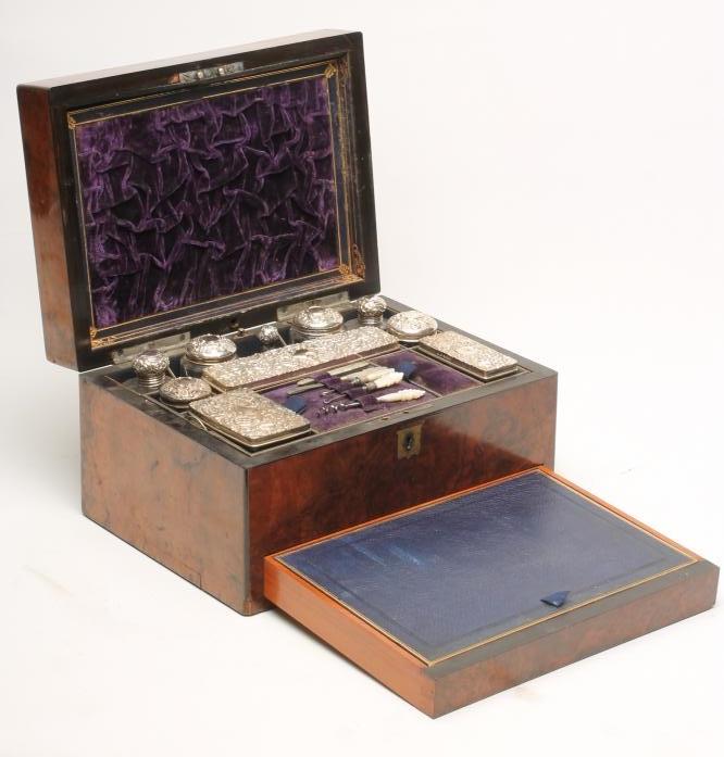 AN EDWARDIAN WALNUT TRAVELLING DRESSING CASE Image