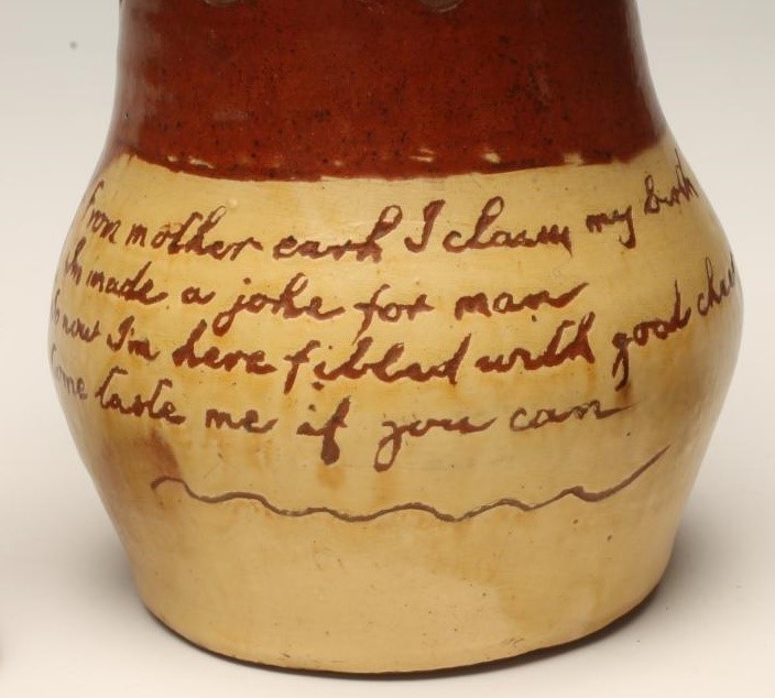 A SLIPWARE PUZZLE JUG Image