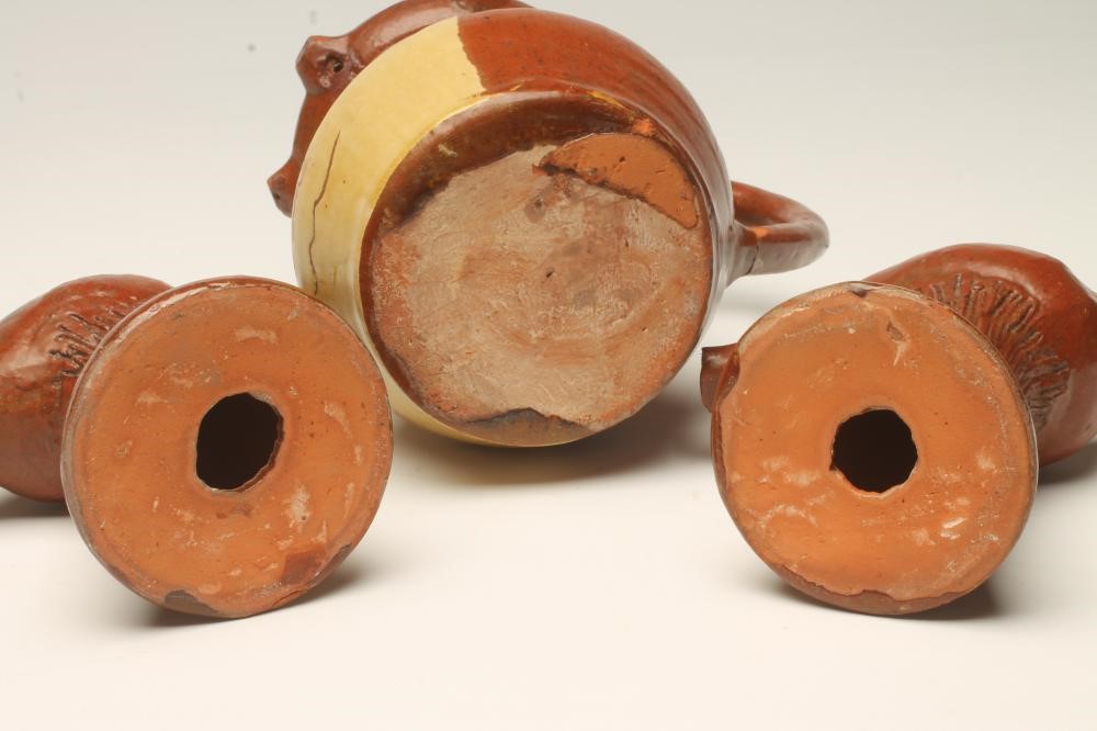 A SLIPWARE PUZZLE JUG Image