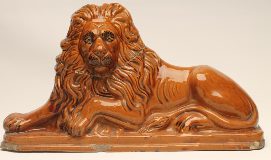 A VICTORIAN DERBYSHIRE FLATBACK STONEWARE FIREPLACE LION Image