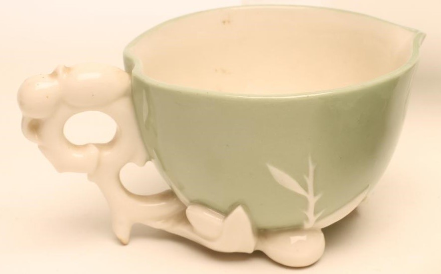 AN AESTHETIC PERIOD MINTON PARIAN CELADON GLAZED SOLITAIRE Image