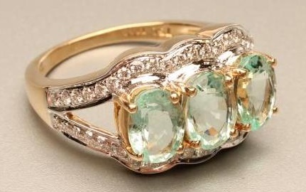 A DIAMOND AND GEM SET COCKTAIL RING Image