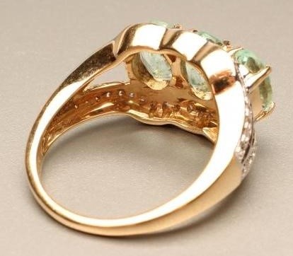A DIAMOND AND GEM SET COCKTAIL RING Image