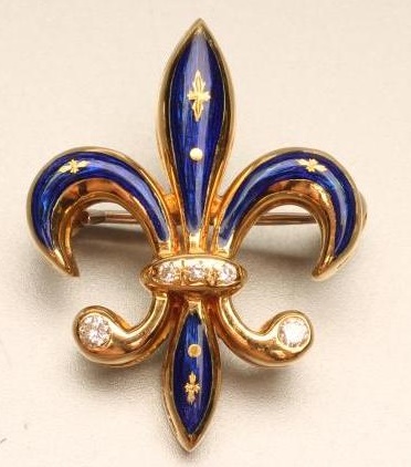 A "HOUSE OF FABERGE" 18KT GOLD AND DIAMOND FLEUR DE LYS BROOCH with blue enamelling Image