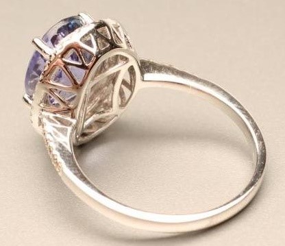 A TANZANITE AND DIAMOND RING Image