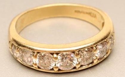 A SEVEN STONE DIAMOND RING Image