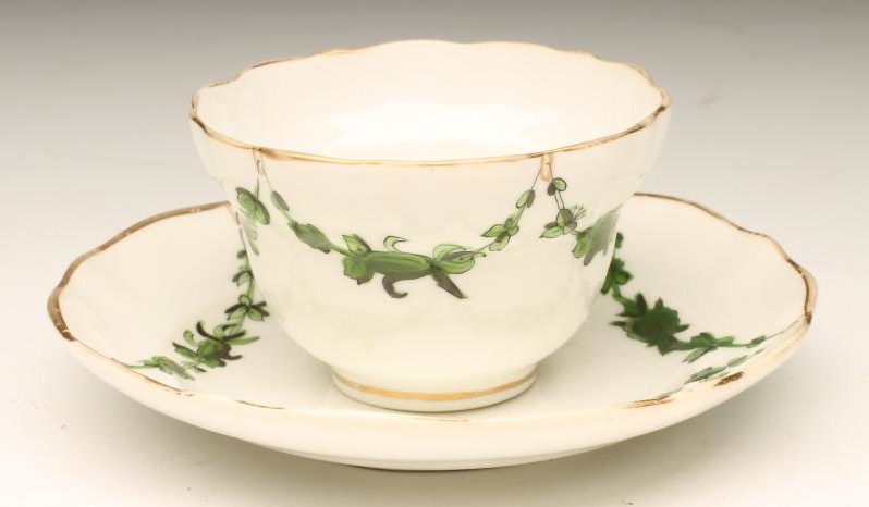 A BRISTOL PORCELAIN SMALL TEABOWL AND SAUCER Image