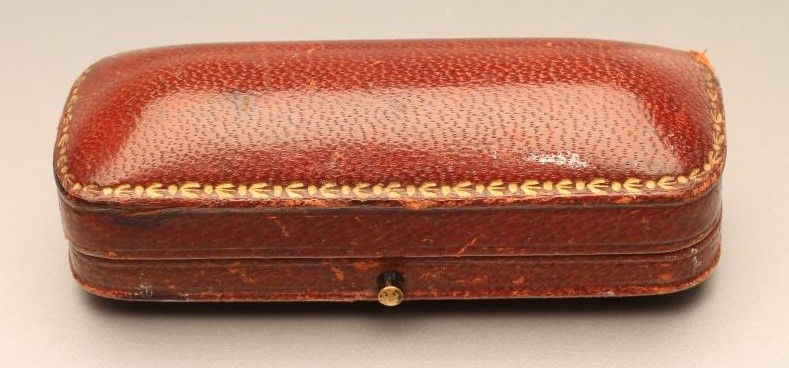 A SET OF THREE 9CT GOLD SHIRT STUDS each set with a cabochon polished ruby Image