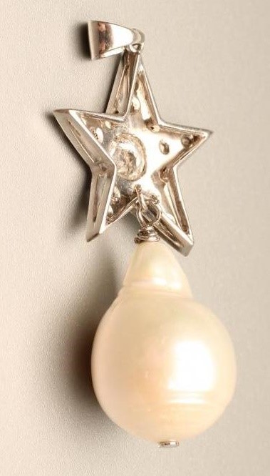 A PEARL AND DIAMOND PENDANT Image