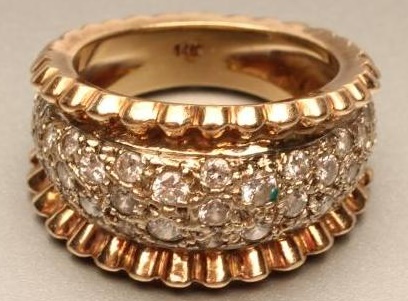 A DIAMOND HALF HOOP COCKTAIL RING Image