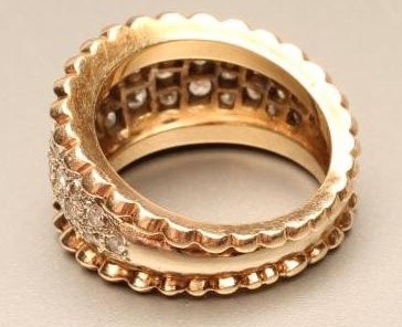 A DIAMOND HALF HOOP COCKTAIL RING Image