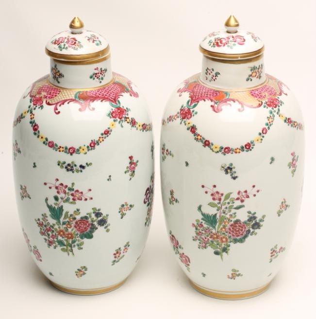 A PAIR OF CONTINENTAL PORCELAIN VASES AND COVERS Image