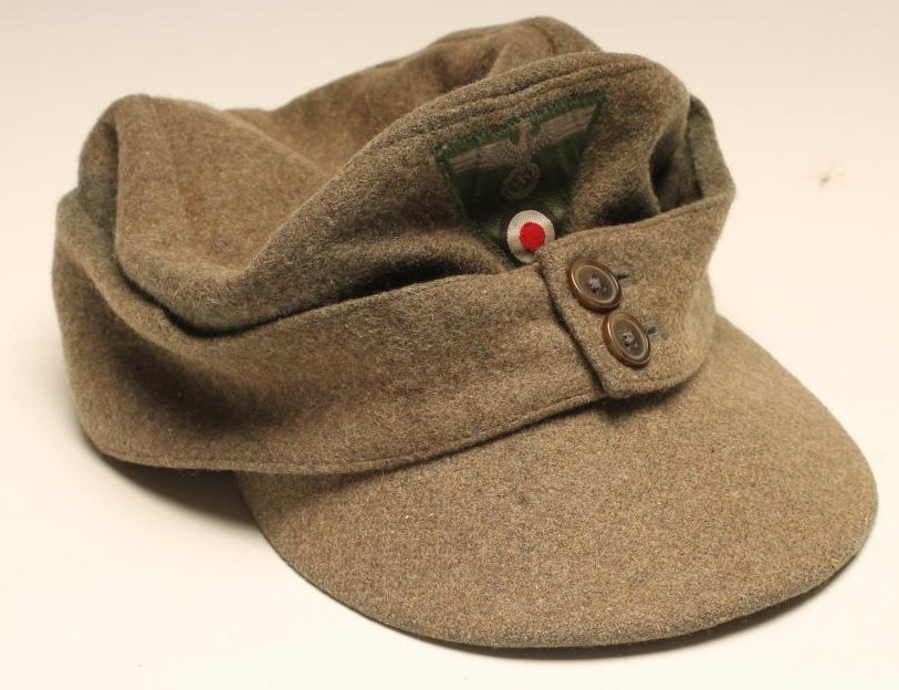 A third reich army forage cap of typical form with triangular stitched ...