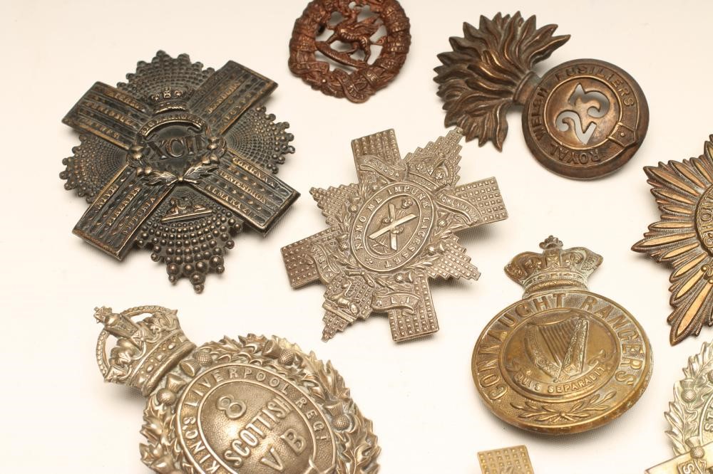 ELEVEN BRITISH MILITARY BADGES comprising eight Scottish regimental cap badges Image