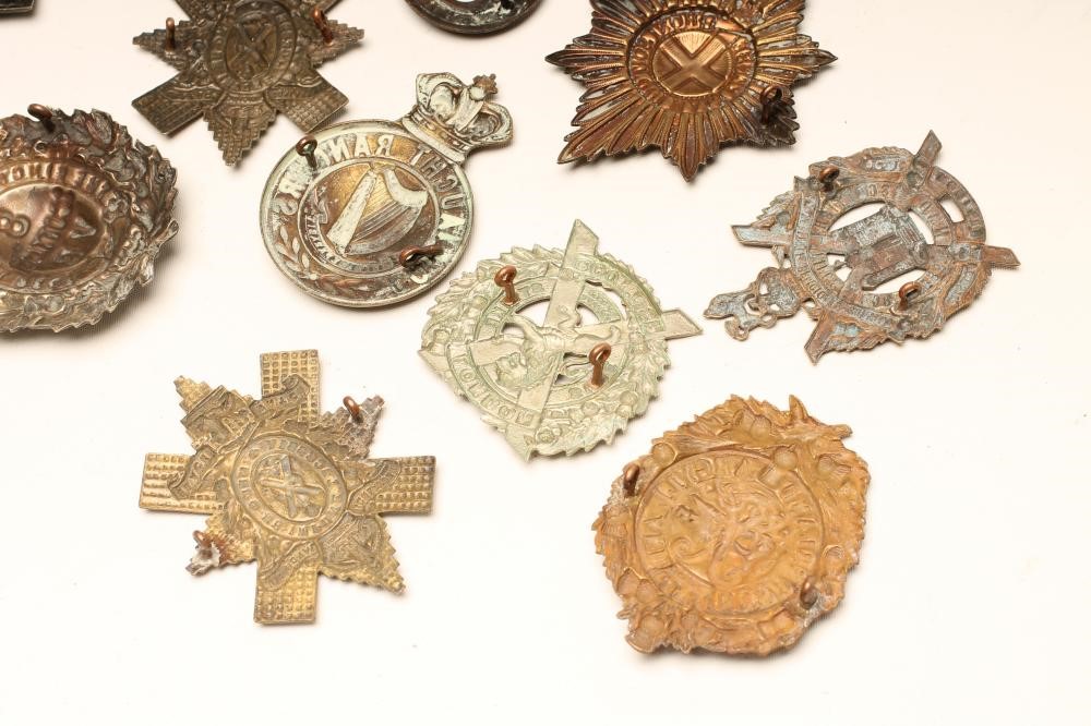 ELEVEN BRITISH MILITARY BADGES comprising eight Scottish regimental cap badges Image