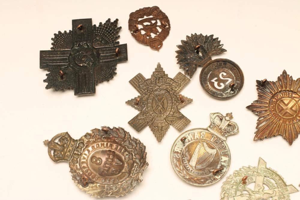 ELEVEN BRITISH MILITARY BADGES comprising eight Scottish regimental cap badges Image