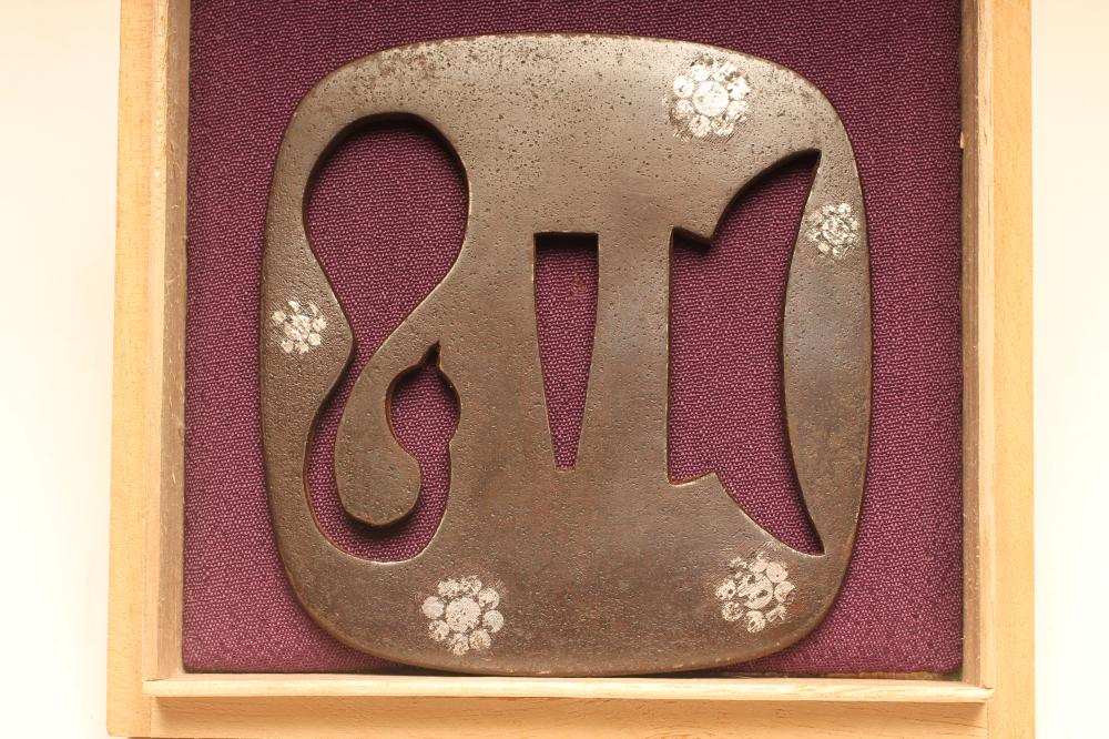 A JAPANESE TSUBA of rounded oblong form Image