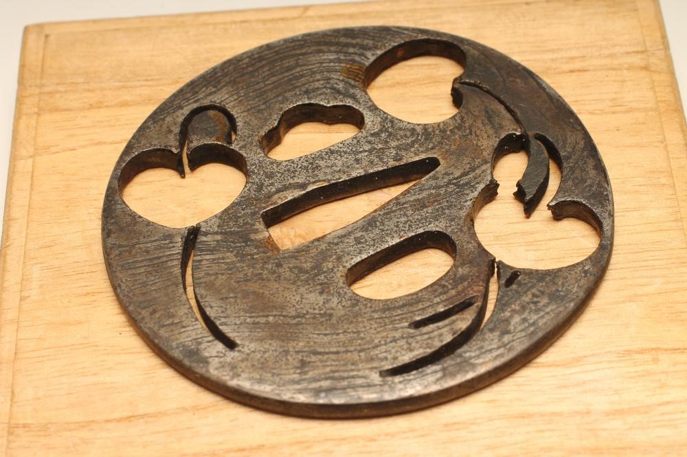 A JAPANESE TSUBA of circular form Image