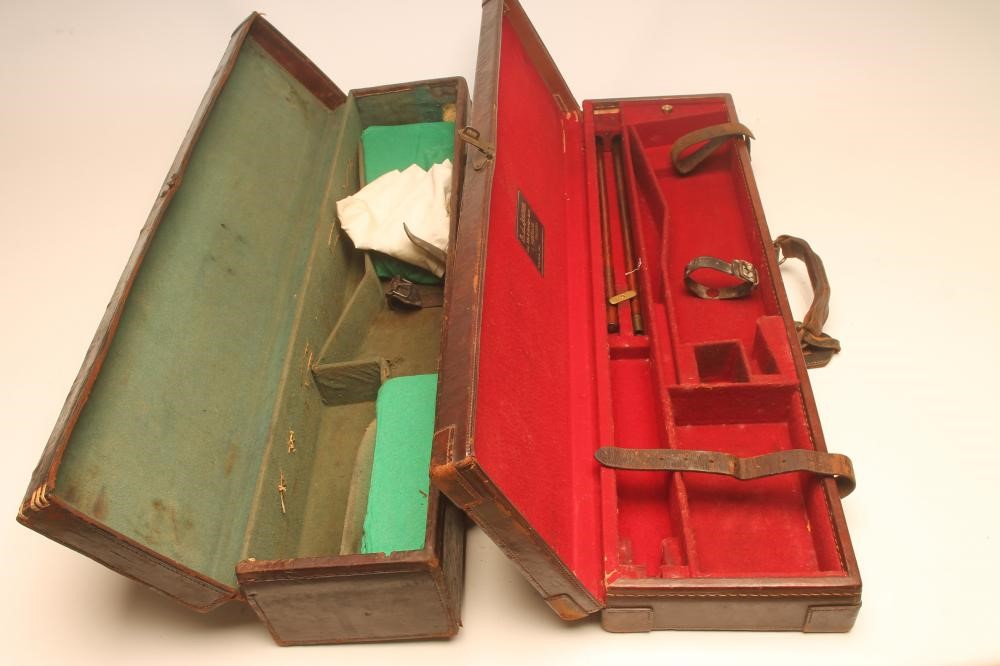 A LEATHER SHOTGUN CASE with red baize fitted interior Image