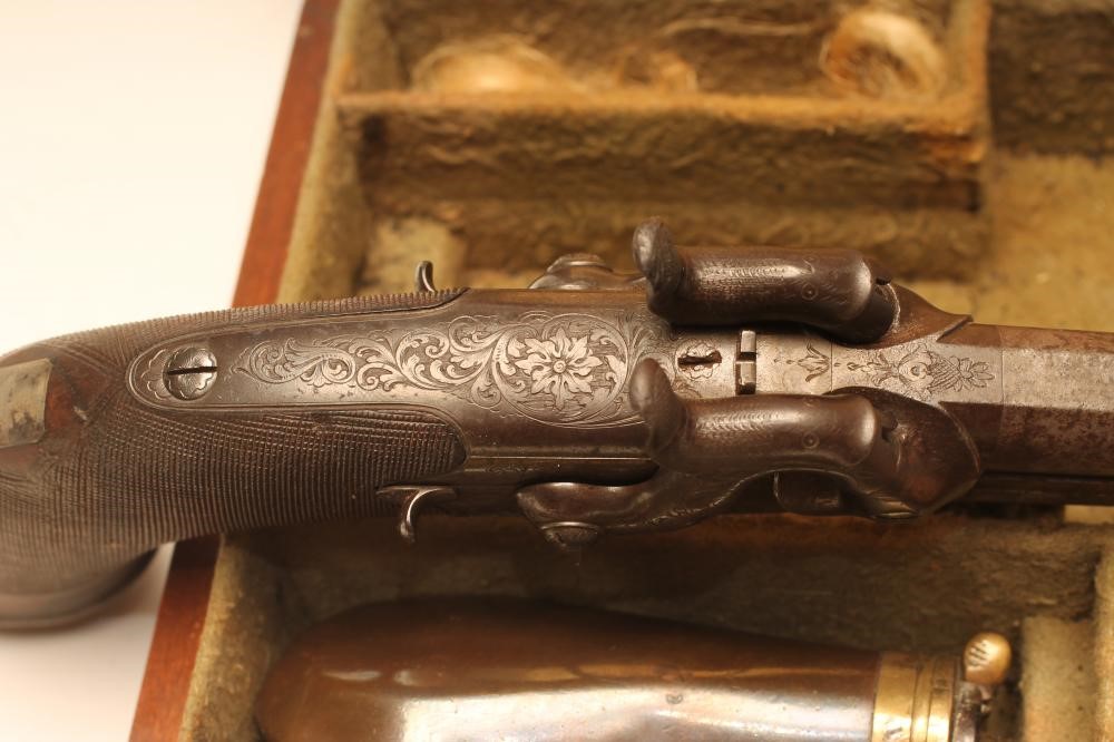 A DOUBLE BARRELLED OVER & UNDER PERCUSSION PISTOL by W. Jackson Image