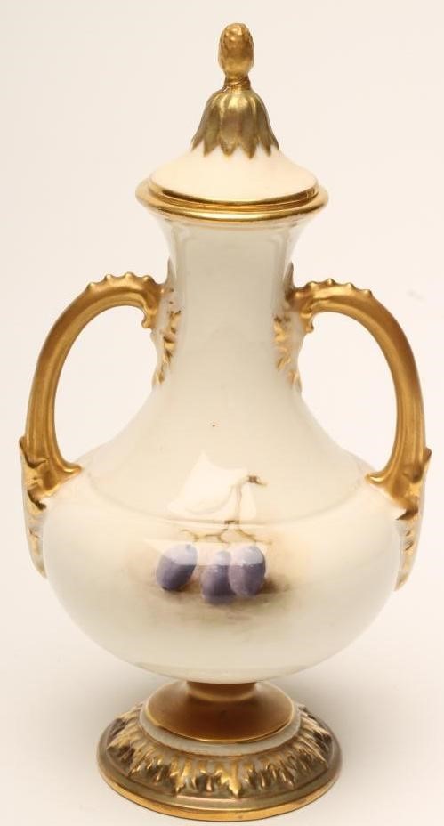 A ROYAL WORCESTER CHINA VASE AND COVER Image