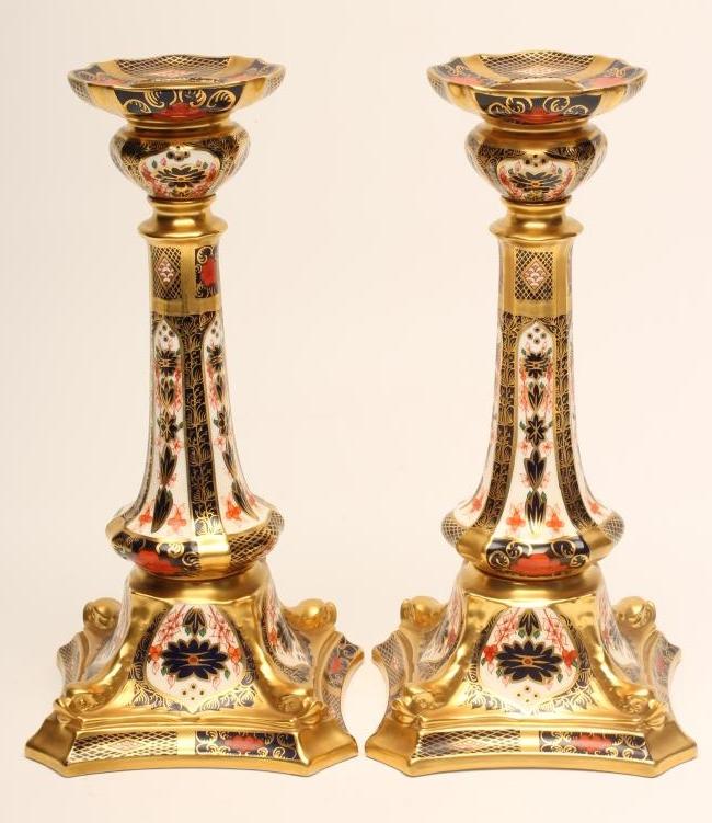 A PAIR OF ROYAL CROWN DERBY CHINA "CASTLEFORD" CANDLESTICKS Image