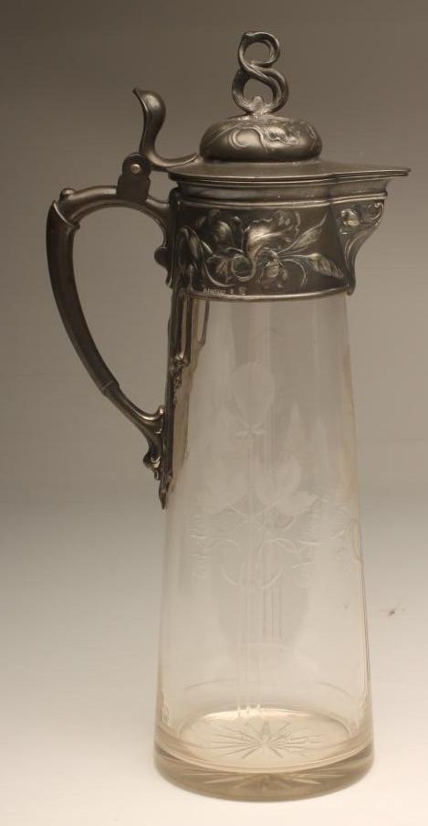 AN ART NOUVEAU PLEWKIEWICZ PEWTER MOUNTED CLARET JUG Image