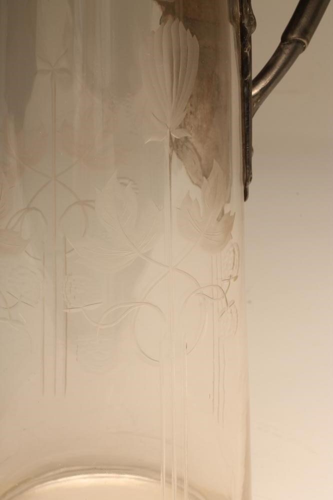 AN ART NOUVEAU PLEWKIEWICZ PEWTER MOUNTED CLARET JUG Image