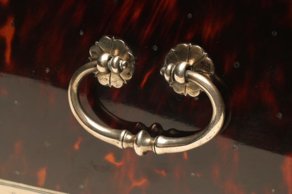 AN INDO-PORTUGUESE TORTOISESHELL AND IVORY VENEERED TRAVELLING BOX Image