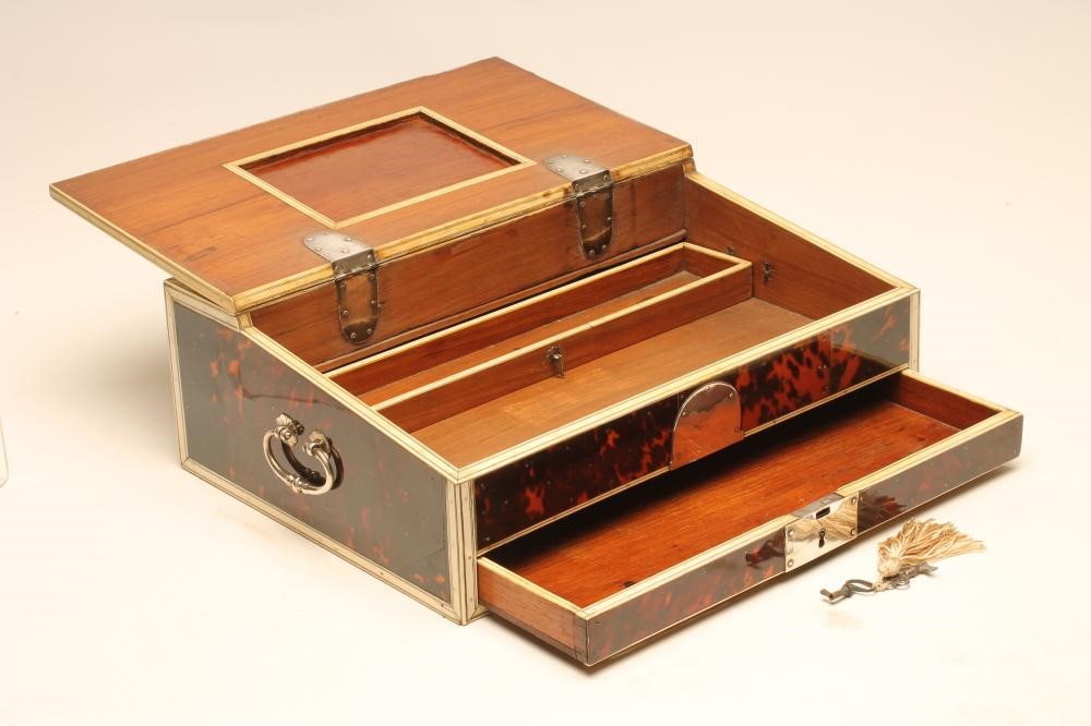 AN INDO-PORTUGUESE TORTOISESHELL AND IVORY VENEERED TRAVELLING BOX Image