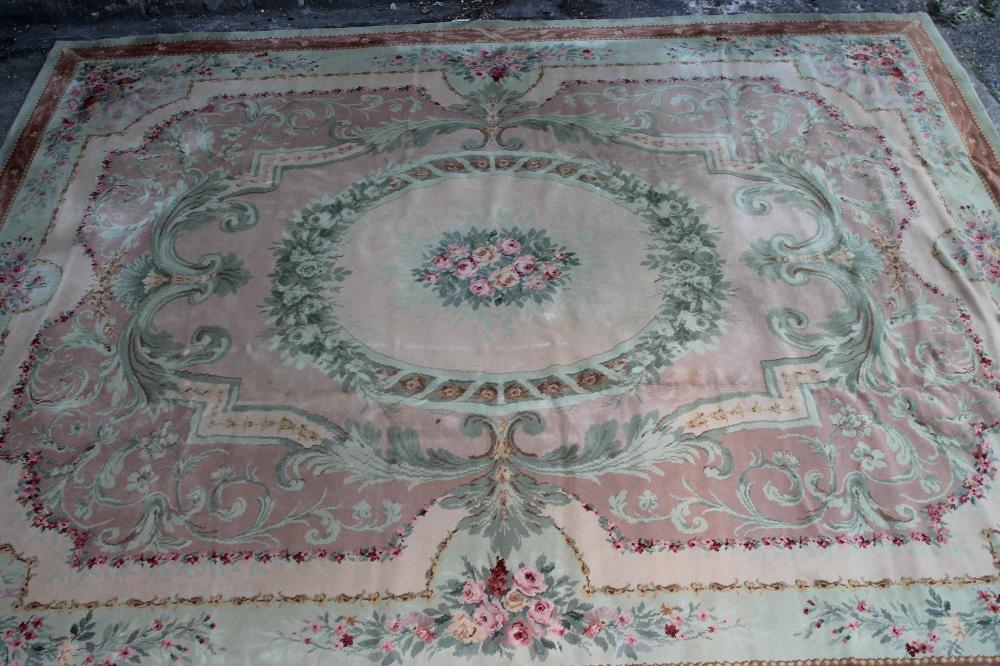 A SAVONNERIE STYLE MACHINE WOOL CARPET Image