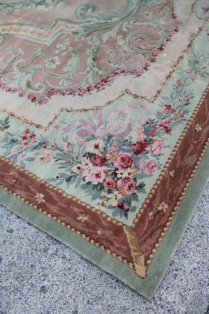A SAVONNERIE STYLE MACHINE WOOL CARPET Image