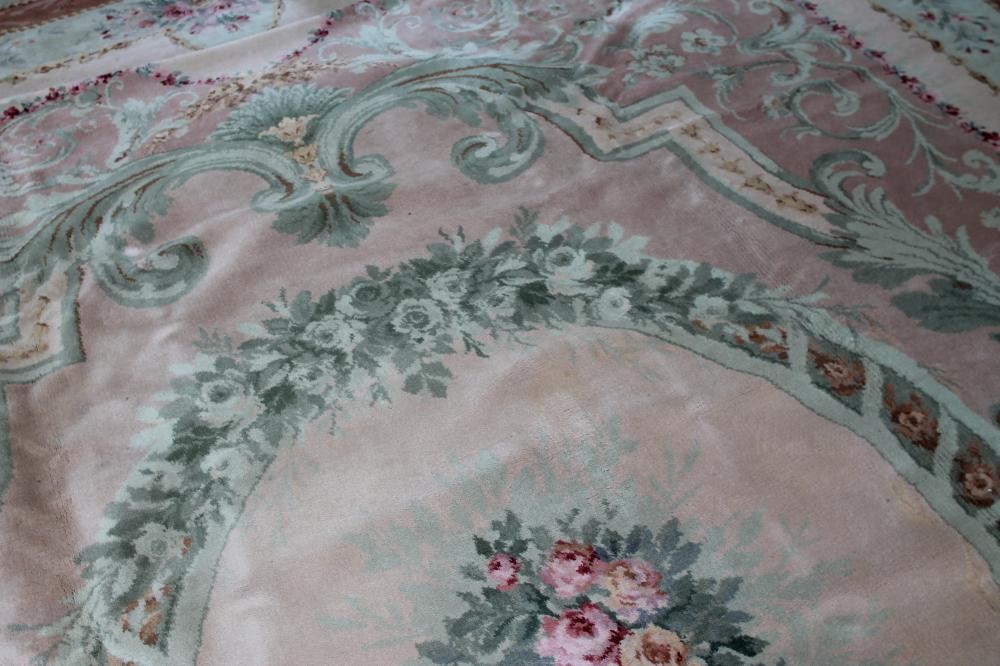 A SAVONNERIE STYLE MACHINE WOOL CARPET Image