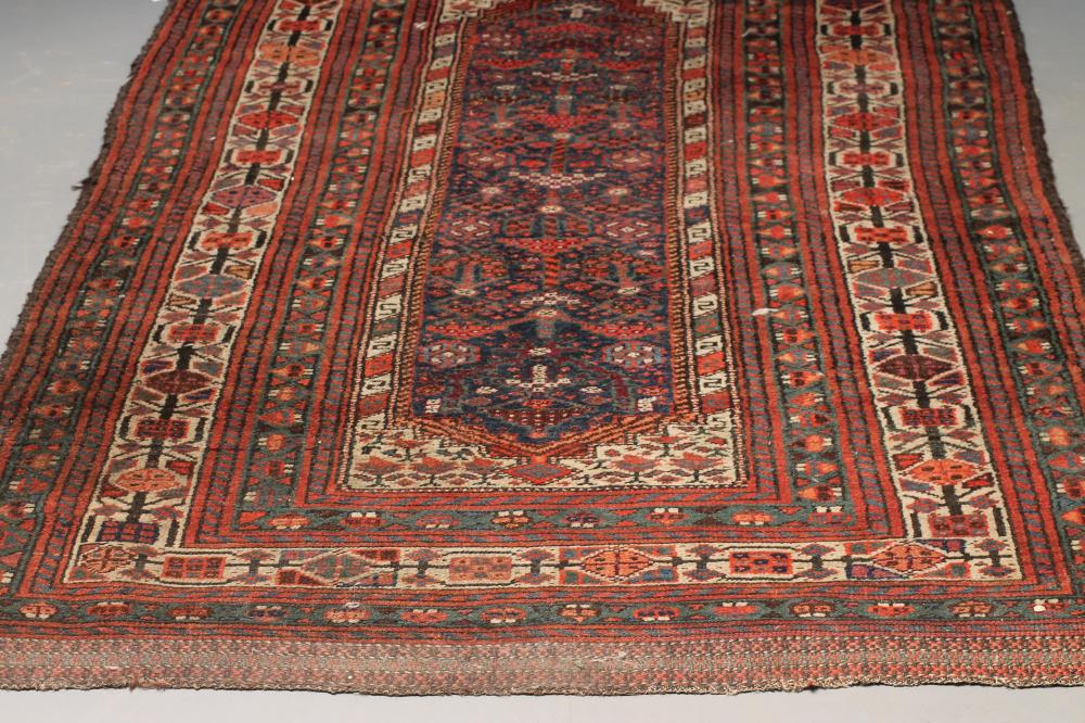 A PERSIAN TRIBAL RUG Image