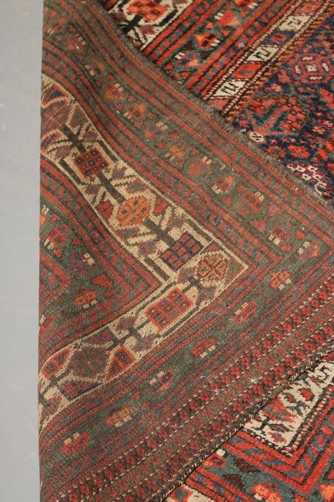 A PERSIAN TRIBAL RUG Image