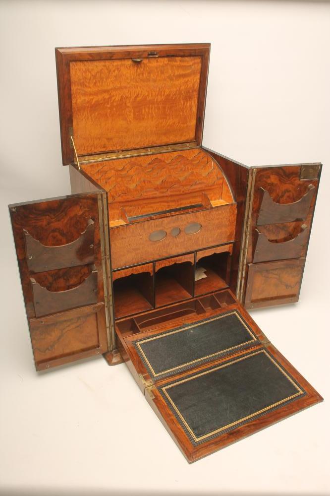 A VICTORIAN WALNUT TABLE WRITING CABINET of oblong form Image