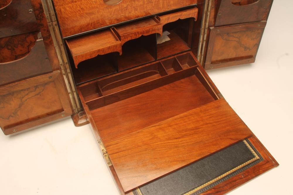 A VICTORIAN WALNUT TABLE WRITING CABINET of oblong form Image