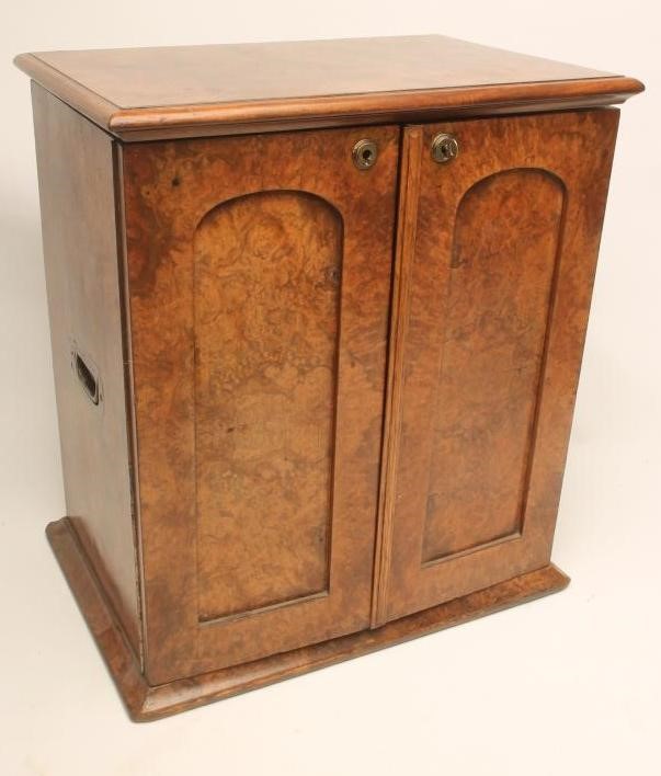 A VICTORIAN WALNUT TABLE WRITING CABINET of oblong form Image