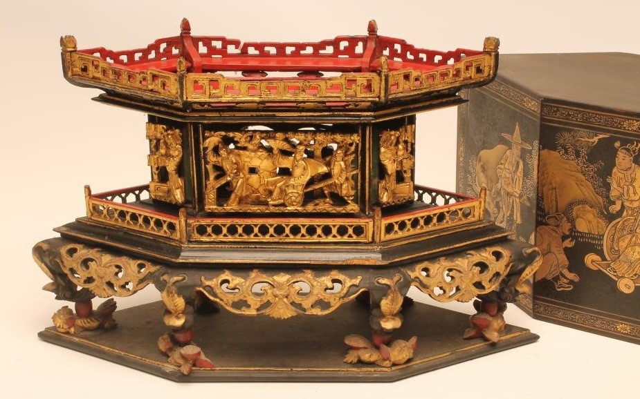 A CHINESE LACQUER TRAVELLING SHRINE of elongated hexagonal form Image