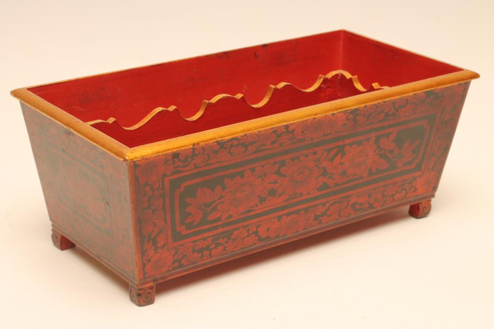 A LACQUER OPEN CASKET Image