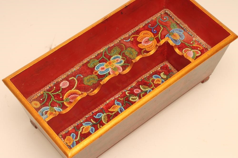 A LACQUER OPEN CASKET Image