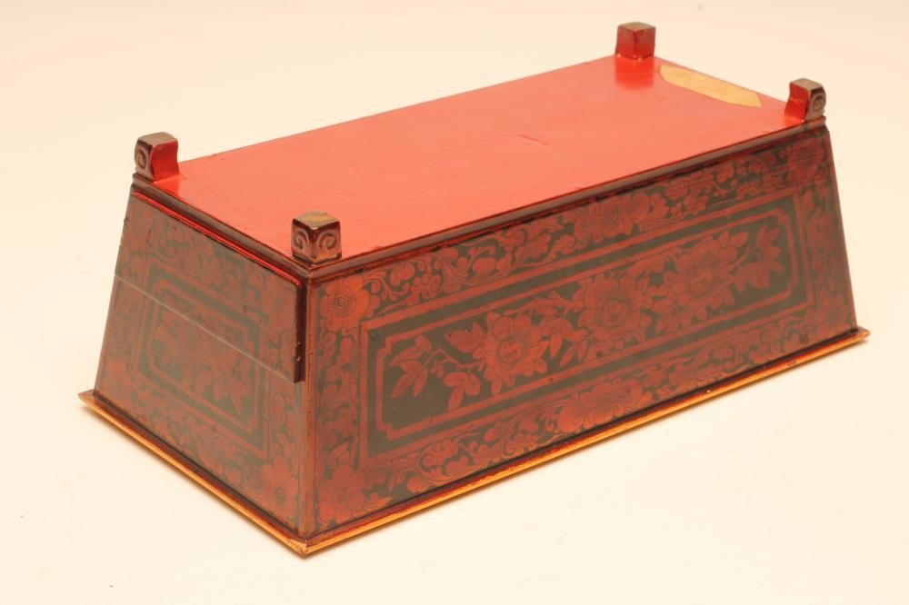 A LACQUER OPEN CASKET Image