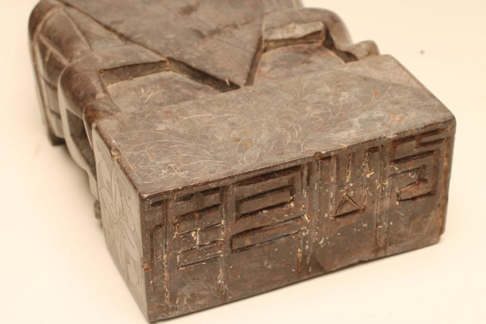 A PAIR OF CHINESE SOAPSTONE FIGURES carved as bearded dignitaries seated on a throne and holding a Image