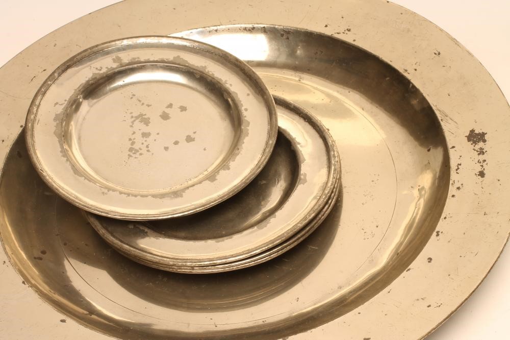 A GEORGIAN PEWTER CHARGER of plain rim form with ownership initials to rear Image