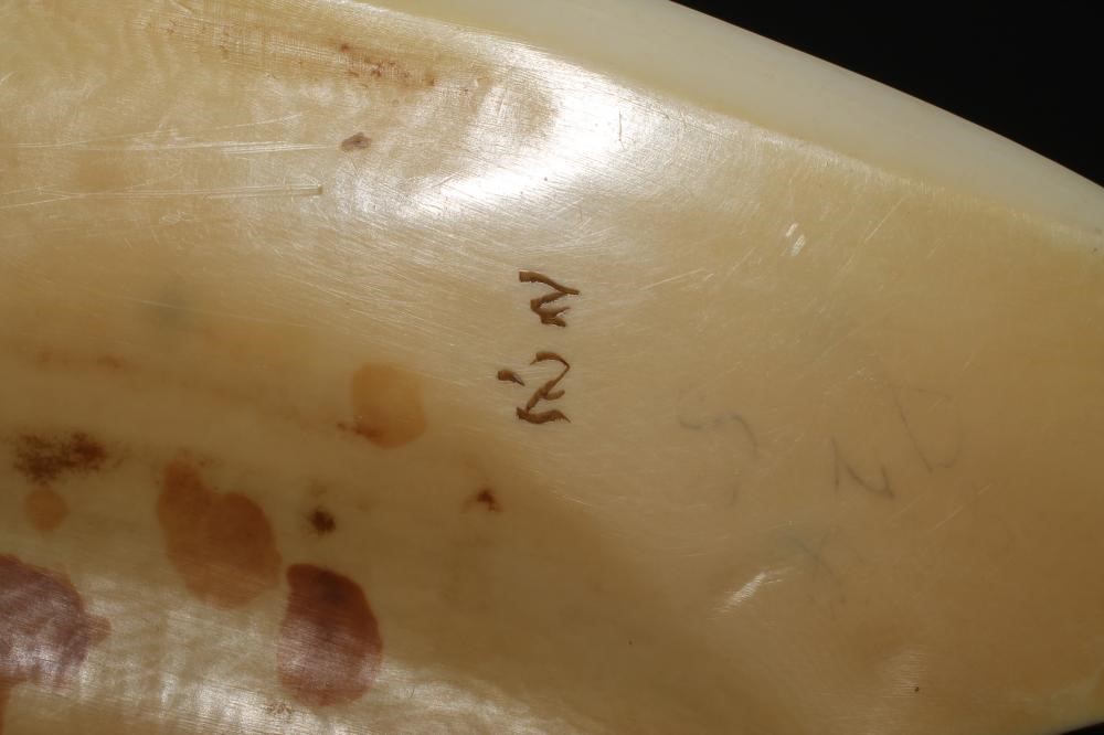 A JAPANESE IVORY FIGURE GROUP Image