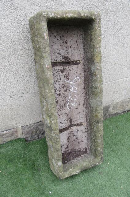 A SANDSTONE TROUGH of rough hewn oblong form Image