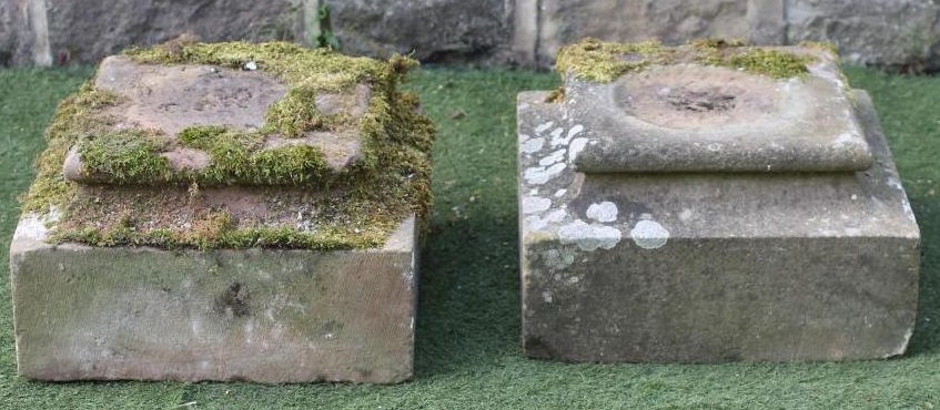 A PAIR OF SANDSTONE PLINTHS of shallow square form with cushion moulded top and waisted centre Image