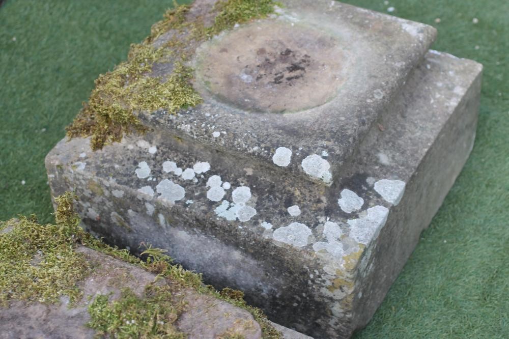 A PAIR OF SANDSTONE PLINTHS of shallow square form with cushion moulded top and waisted centre Image